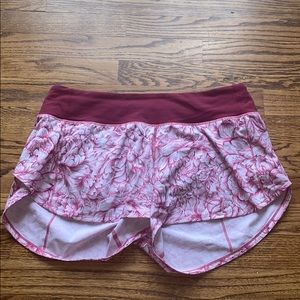 Pink lululemon shorts with white flowers